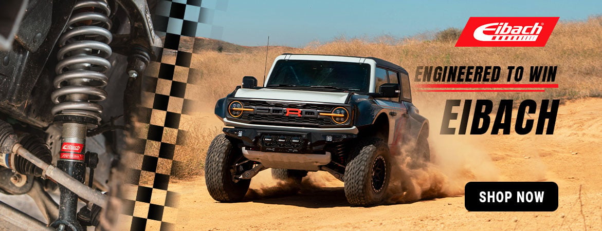 Eibach Engineered to Win banner featuring a Bronco Raptor cornering off-road. Shop Eibach springs, lift kits, shocks, coilovers, and suspension upgrades built for control, clearance, and performance.